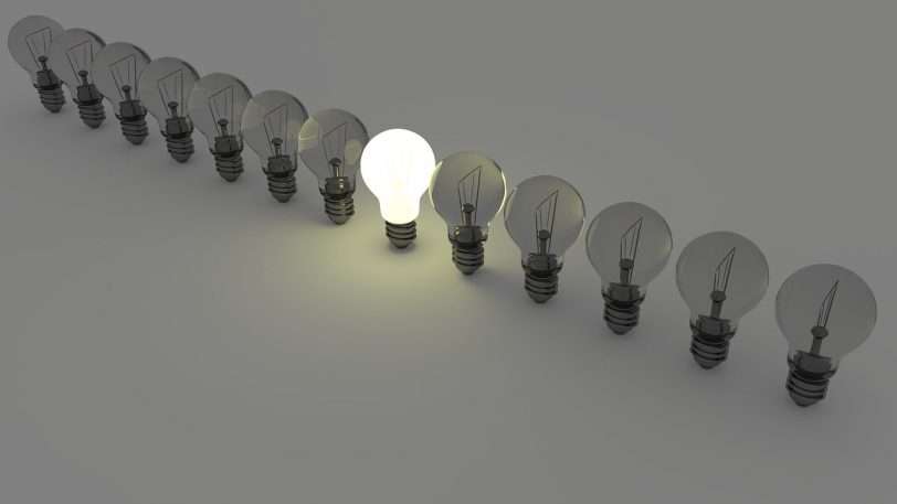 a light bulb showing how you can stand out by asking the right interview questions